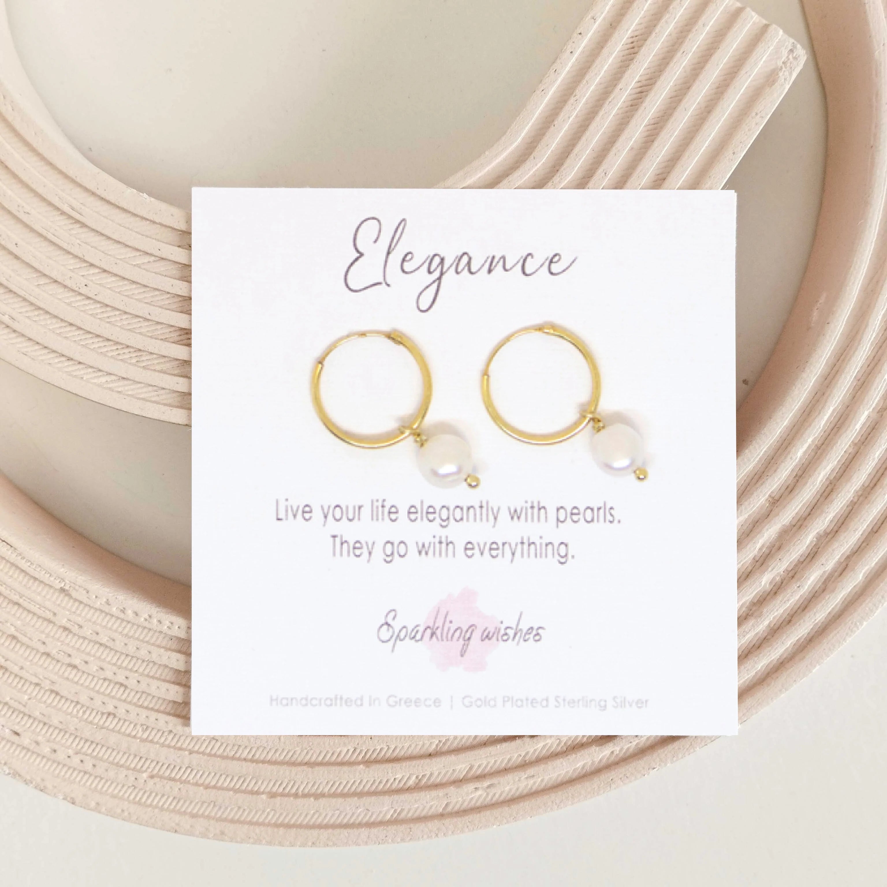 Orecchini Elegance con perla pendente