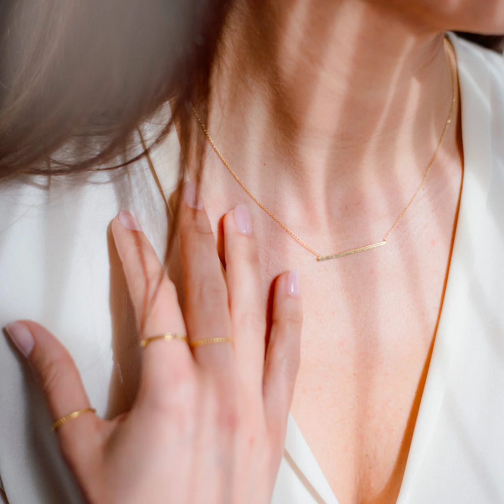 collana balance  in argento a forma di barretta